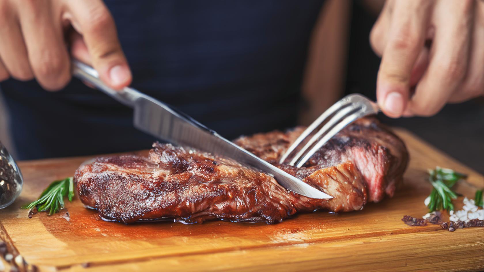 Man eating a steak