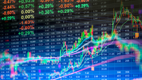 The image shows computer screens of the stock market.