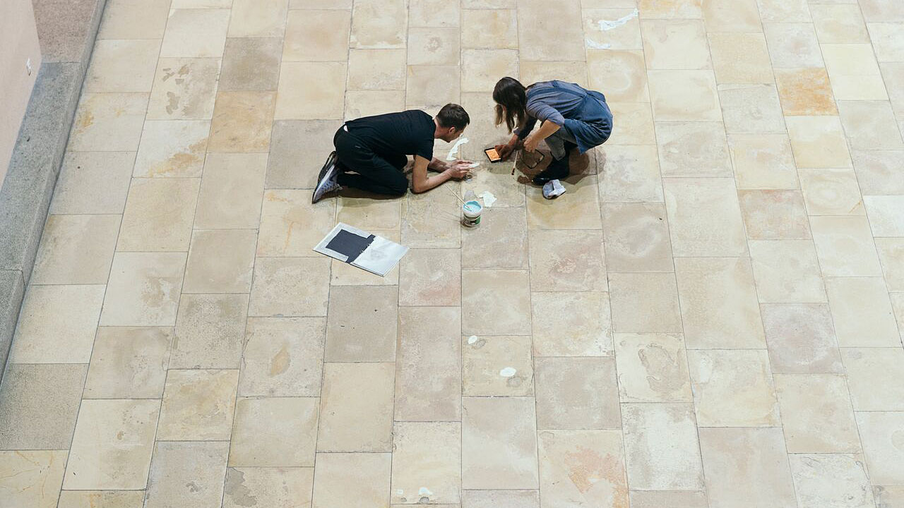 The branch-like grooves of the stone floor in the Lichthof...