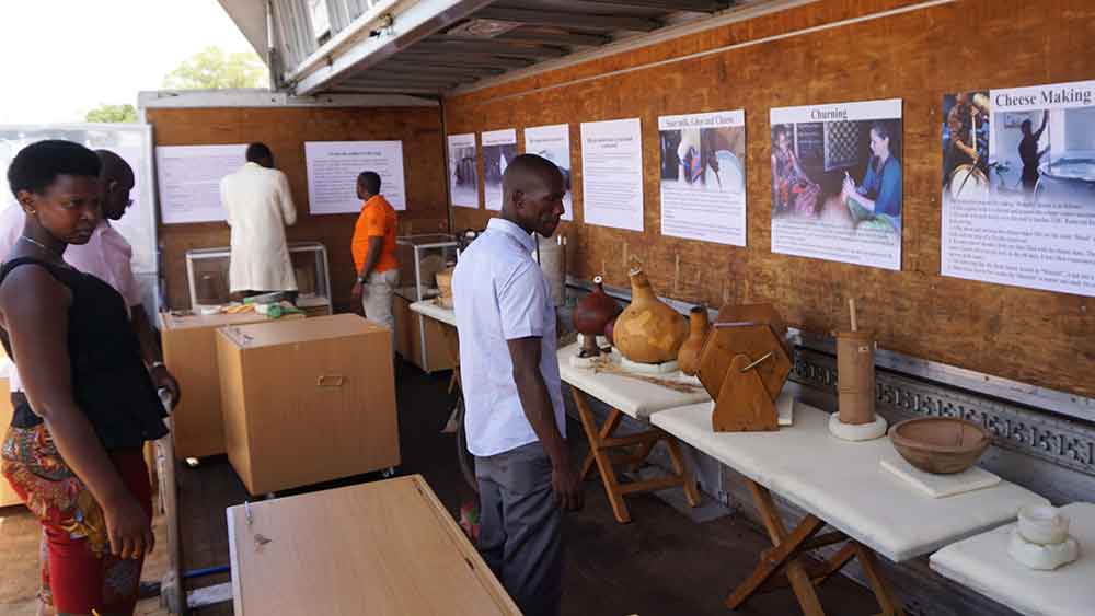 View into the exhibition room with numerous artefacts of the Ugandan and Swiss milk culture.